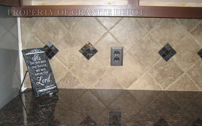 Tan Brown granite and chisel edged splash tiles with glass tile (mosaic) inserts